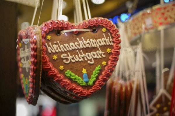 Night shot, gingerbread heart, Stuttgart Christmas market lettering, Christmas stand, Christmas market, Stuttgart, Baden-WÃ¼rttemberg, Germany