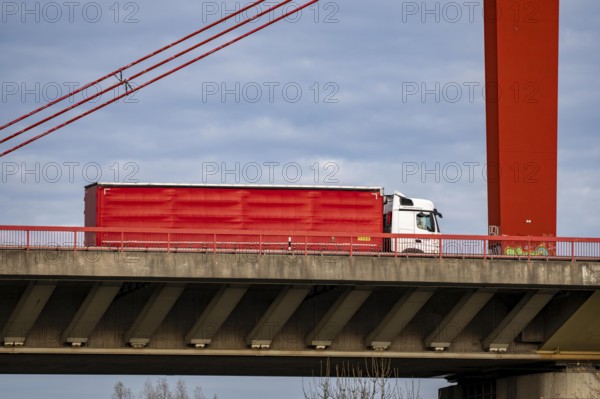 Truck, truck with trailer, on the A42 bridge across the Rhine near Duisburg-Beeckerwerth