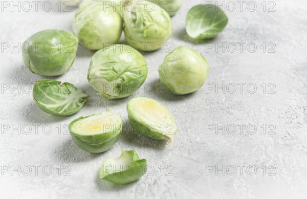Fresh Brussels sprouts, raw, top view, on a gray table, no people
