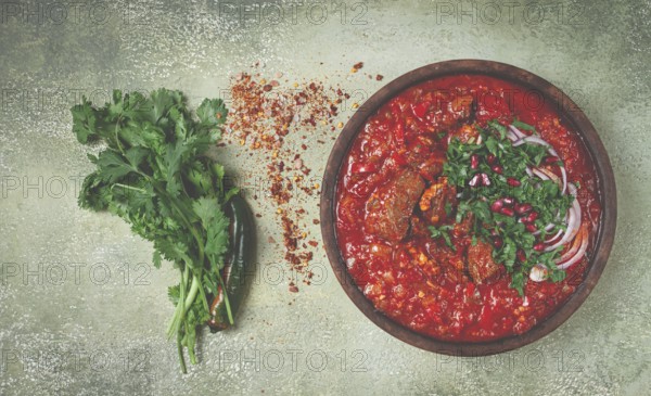 Chashushuli, a traditional Georgian dish, spicy, stewed meat with tomatoes and spices, homemade, no people