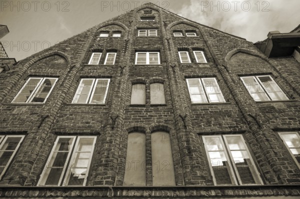 Brick Gothic house built in 1321, Sepia, Hanseatic City of LÃ¼beck, Schleswig-Holstein, Germany