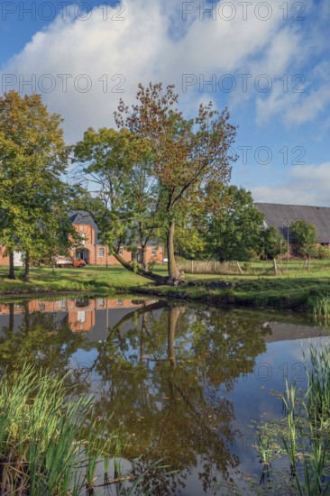 Historic stables with pond at Gut Othenstorf, 1923, Othenstorf, Mecklenburg-Western Pomerania, Germany