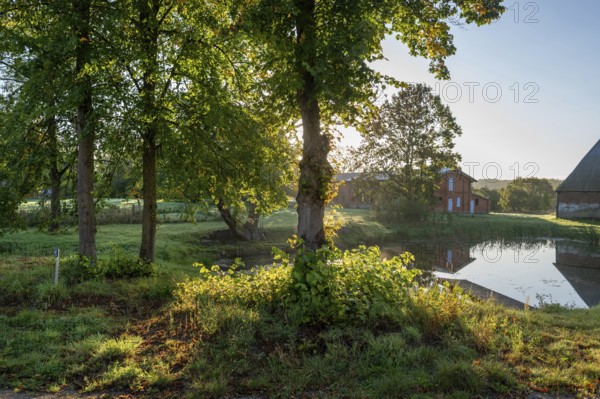 Manor with historic stables and pond, from 1923, Gut Othenstorf, Mecklenburg-Western Pomerania, Germany