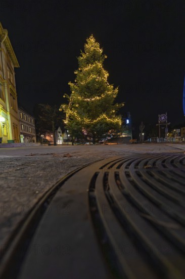 A Christmas tree shot from below with lights at night, Aidlingen, Böblingen district, Germany