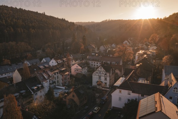 Picture of a village in a soft evening mood surrounded by hills and setting sun, Dillweisenstein, Pforzheim, Germany