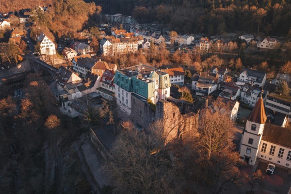 Aerial view of a village with castle and hills in the background, in the evening light, Dillweisenstein, Pforzheim, Germany