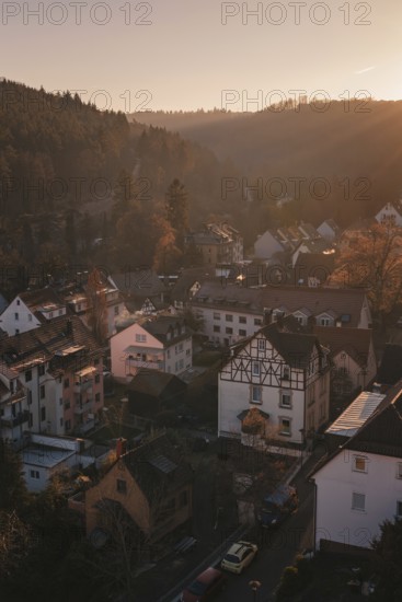 View of a village in a hilly landscape, with half-timbered houses and a harmonious sunset, Dillweisenstein, Pforzheim, Germany