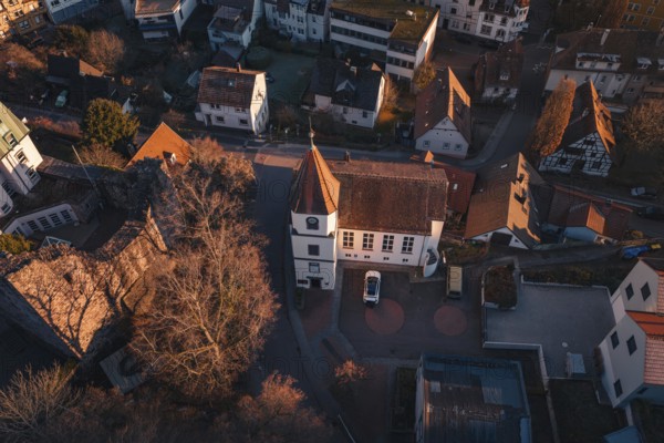 View of a charming village with a church in an autumnal setting, Dillweisenstein, Pforzheim, Germany