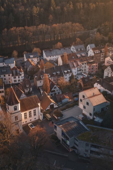 Small-scale view of a charming village with half-timbered houses in the evening light, Dillweisenstein, Pforzheim, Germany