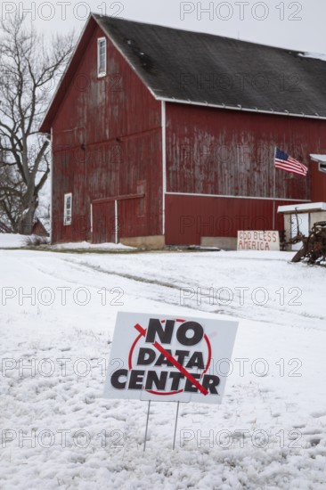 Saline, Michigan USA - 1 December 2025 - A sign on a rural Michigan road opposes a planned $7 billion data center on southeast Michigan farm land. Opponents say the Data Center could raise residential electricity rates and endanger the water supply