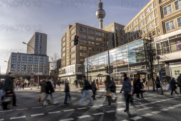 Passers-by on a GrunerstraÃŸe pedestrian crossing near Alexander Platz, Berlin Radio Tower, Berlin, Germany