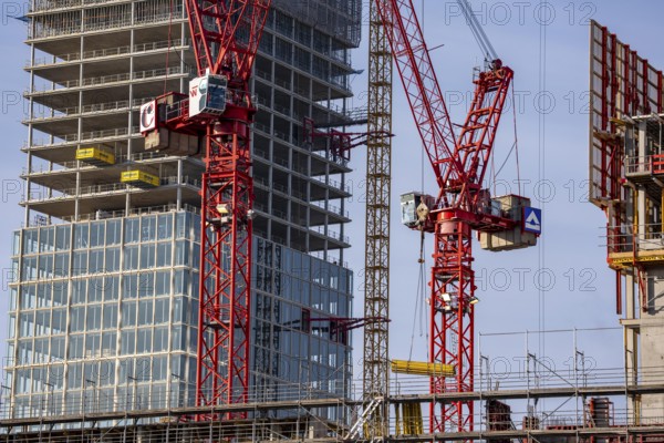 Construction site of the Covivio skyscraper in front, in the vicinity of Alexanderplatz in Berlin, mixed use of apartment, offices, retail and a daycare center, the high-rise construction site of The Berlinian office high-rise building in the back, Germany