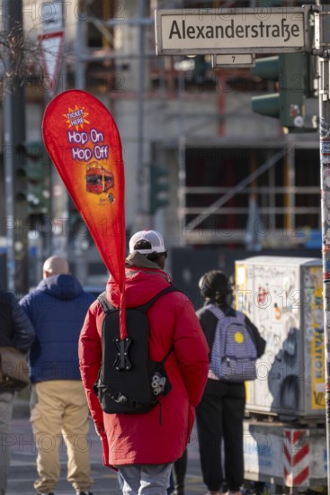 Ticket seller at AlexanderstraÃŸe, Alexanderplatz of the round bus hop on hop off, Berlin, Germany