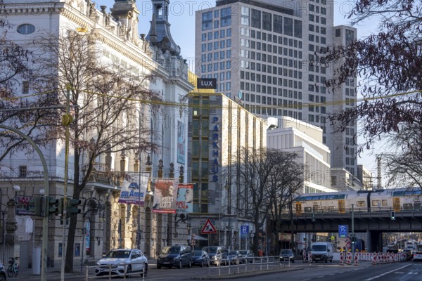 Different types of buildings, houses on KantstraÃŸe in Berlin, Stage Theater des Westens, Motel One Ku'damm, Hochaus des Waldorf Astoria Hotel, S-Bahn Zug, Germany