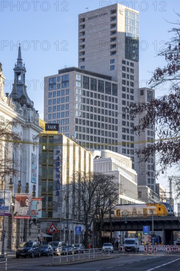 Different types of buildings, houses on KantstraÃŸe in Berlin, Stage Theater des Westens, Motel One Ku'damm, Hochaus des Waldorf Astoria Hotel, S-Bahn Zug, Germany