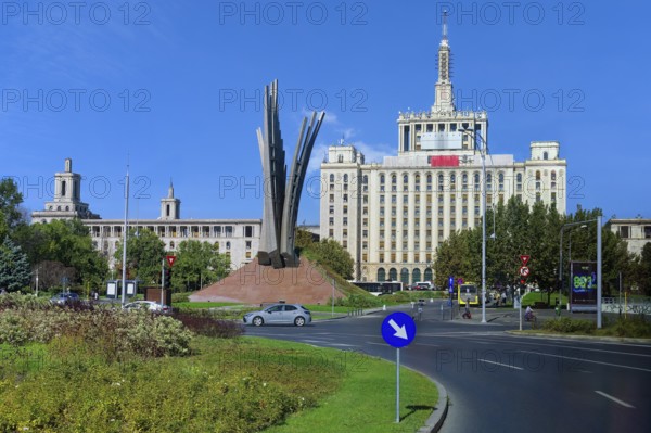 House of the Free Press in Stalinist architectural style and Wings monument, Bucharest, Romania