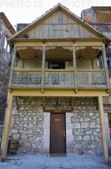 Historic wooden house with carved balcony and stone base, rustic charm, old town, Sharambeyan Street, Dilijan, Dilijan, Delijan, Delijan, Tavush Province, Armenia