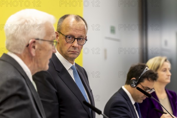 Annual event on the BW Automotive Industry Strategy Dialogue (SDA) in Stuttgart. Winfried Kretschmann, (Greens, Minister-President BW), Friedrich Merz (CDU, Federal Chancellor) . Automotive industry conference. Stuttgart, Baden-WÃ¼rttemberg, Germany