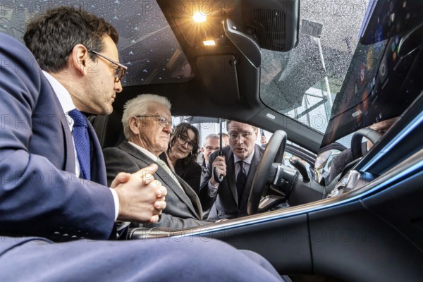 Annual event on the BW Automotive Industry Strategy Dialogue (SDA) in Stuttgart. Winfried Kretschmann, (Greens, Minister-President BW) and Ola KÃ¤llenius (CEO of Mercedes-Benz Group AG) in the Mercedes GLC 400. In the foreground Stéphane Séjourné (Executive Vice President of the European Commission and Commissioner for Prosperity and Industrial Strategy) . Automotive industry conference. Stuttgart, Baden-WÃ¼rttemberg, Germany