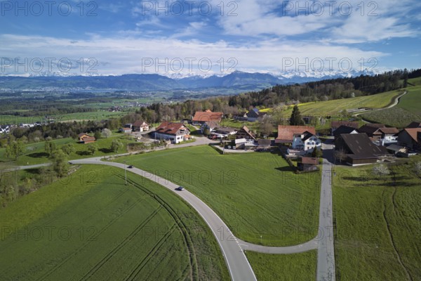 View of the hamlet of Brunnwil, with Rigi and the snowy Alps in the back, Beinwil, Freiamt, Canton, Aargau, Switzerland