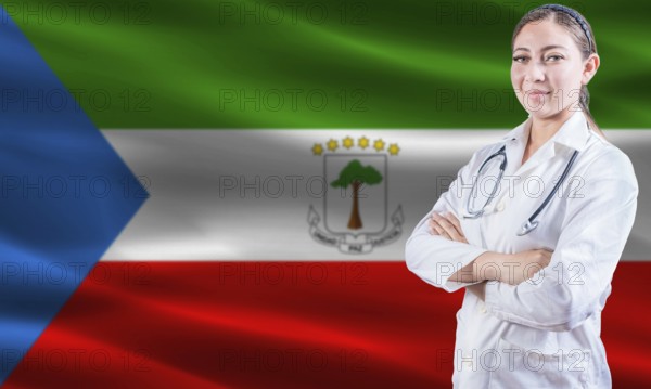 Female doctor on Equatorial Guinea flag. Doctor with crossed arms on Equatorial Guinea flag. Equatorial Guinean health and care concept