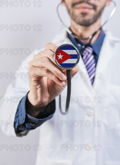 Cuba health and medical insurance concept. Cuba healthcare system, doctor holding stethoscope