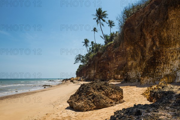 Lonely beach with red rocks and coconut trees, Red Cliffs, Bang Saphan Noi, Prachuap Khiri Khan Province, Central Thailand, Thailand
