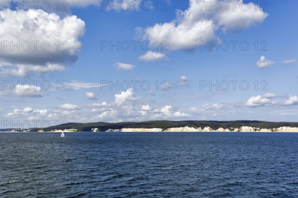 Distinctive white cliffs, famous chalk cliffs, Jasmund National Park, sailboat, Cumulus, RÃ¼gen island, Germany