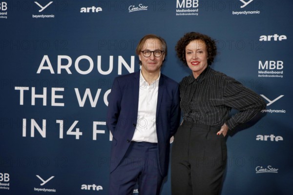 Bernhard Karl, festival director, and film godmother Maria Schrader at the festival opening and the premiere of the movie 'Sentimental Value' at the 20th World Cinema Festival Around the World in 14 Films at the cinema in the KulturBrauerei in Berlin on 28.11.2025