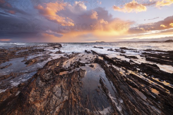 A riot of colors on North Head Beach on the east coast of Australia. Sunset over Rhettman Point