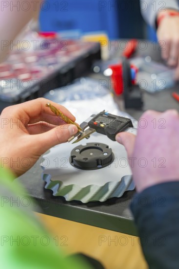 Caliper is used to measure a gear in a technical environment, Jugend Forschungszentrum Nagold, Landkreis Calw, Germany