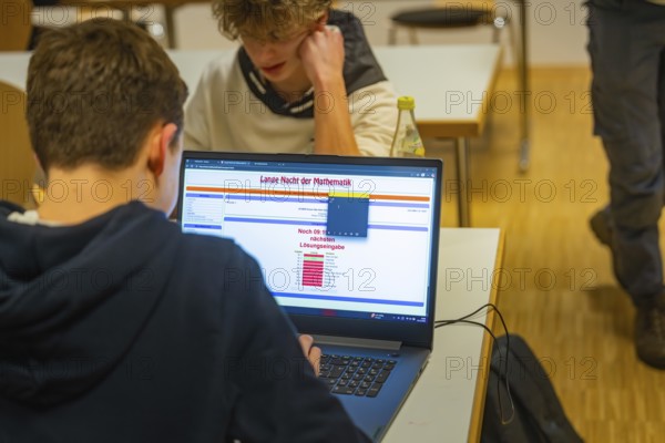 Young people learn mathematics with a laptop in a classroom, Jugend Forschungszentrum Nagold, Calw district, Germany