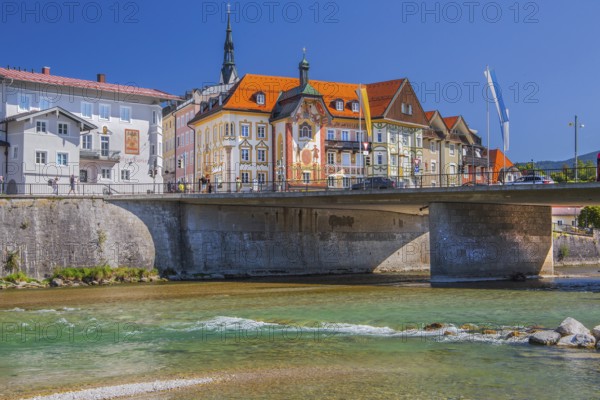Isar bank with Isar bridge and Marienstift or Krugledererhaus, Bad Tölz. Isartal, Upper Bavaria, Bavaria, Germany