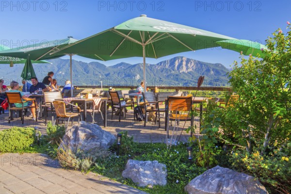 Restaurant terrace from Hofcafe zum Stern in the district of Zell, GroÃŸweil, Loisachtal, Das Blaue Land, Upper Bavaria, Bavaria, Germany