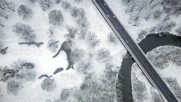 Winter landscape in frost, floodplain landscape, meander, icy, snowy, frost, frozen, river landscape, landscape view, aerial view, Germany from above, federal road, car traffic in winter, habitat, wonderful atmosphere, ice, snow, winter wonderland, close to nature, hibernation, Middle Elbe biosphere reserve, UNESCO World Heritage Site, Saxony-Anhalt