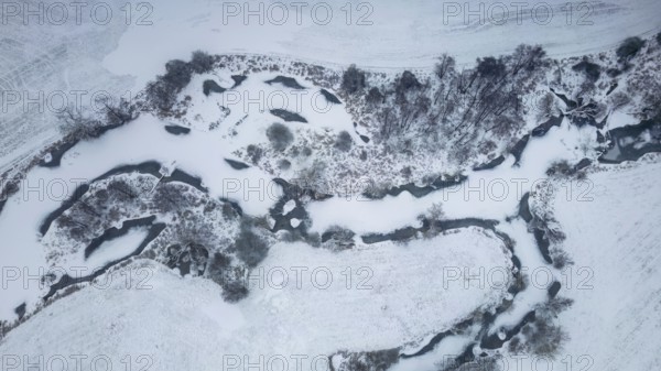 Winter landscape in frost, floodplain landscape, meander, icy, snowy, frost, frozen, river landscape, landscape view, aerial view, Germany from above, habitat, wonderful atmosphere, ice, snow, winter wonderland, close to nature, winter rest, Middle Elbe biosphere reserve, UNESCO World Heritage Site, Saxony-Anhalt
