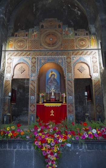 Artfully designed altar in a church, framed by colorful flowers and symbolic images, Sevanavank monastery, Sevan monastery, Gegharkunik province, Armenia