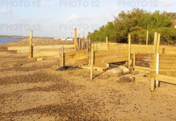 Temporary coastal defences erected by Bawdsey Haven Yacht Club, response to rapid erosion beach depletion, River Deben, Bawdsey, Suffolk, England, UK Nov 2025