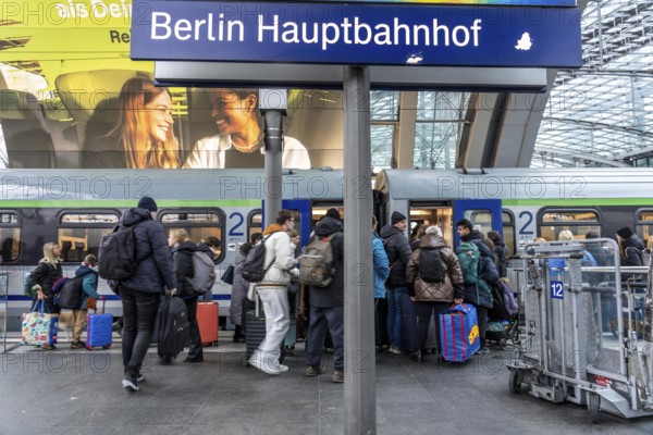 Central Station in Berlin, passengers on the platform, train arrives, Germany