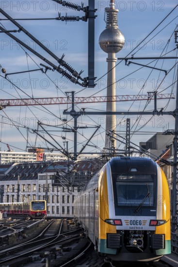 Railway line in Berlin, east of FriedrichstraÃŸe station, looking east, Berlin TV Tower, ODEG Zug on the line