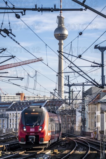 Railway line in Berlin, east of FriedrichstraÃŸe station, looking east, Berlin TV Tower, train on the line