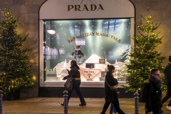 The KaDeWe, department store of the West on TauentzienstraÃŸe in Christmas light decoration, Prada shop window, Berlin, Germany