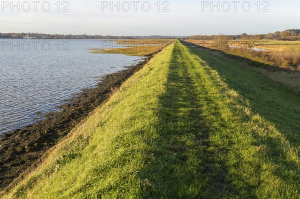 River Deben earthwork bank flood defence wall, Sutton, Suffolk, England, UK