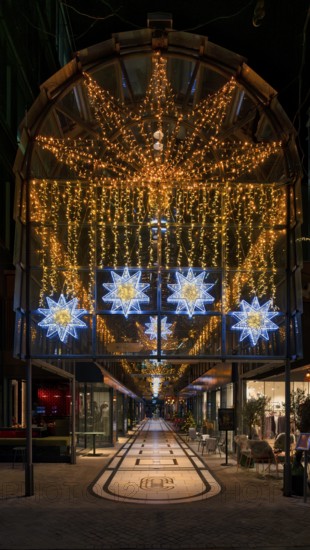 Night view, Calwer Passage, shopping mall, covered, decorated for Christmas, Stuttgart, Baden-WÃ¼rttemberg, Germany