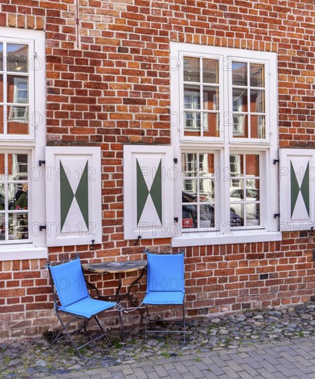 Catering, retail and typical, historic architecture in the Dutch Quarter in Potsdam, Brandenburg, Germany
