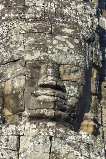 Huge stone-carved face of Bodhisattva Lokeshvara, also Avalokiteshvara, Bayon Temple, Angkor Thom, UNESCO World Heritage Site, Angkor Wat, Siem Reap, Cambodia