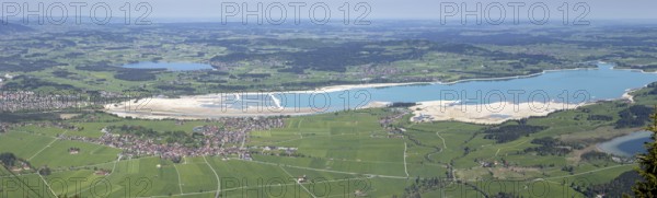 Panorama in spring from Tegelberg, 1881m, of Schwangau, Waltenhofen, Hopfensee and the partly still drained Forggensee, OstallgÃ¤u, Bavaria, Germany