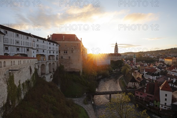Spring morning sunrise with castle view over the rooftops of Krumlov in southern Bohemia, Czech Republic