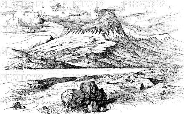 Dormant volcano SkarÃ°sheiÃ°i (1054 m) in the west of the Atlantic island, Hafnarfjalls mountain range, eternal snow, mountain landscape, mountain peaks, geology, tectonics, cloud cover, climate change, travel, volcanism, Iceland, historical illustration around 1900