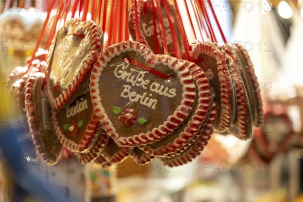 Gingerbread hearts at the Christmas market on Breitscheidplatz, at the Memorial Church, Christmas decoration, light decoration, in Berlin, Germany